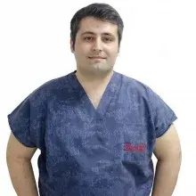 Uzm. Dr. Mehmet Ali Hacıoğlu — Bayraklı, İzmir. Portre fotoğrafı.