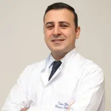 Op. Dr. Dinçer Sümer — Kadın Hastalıkları Ve Doğum, Ankara. Portre fotoğrafı.