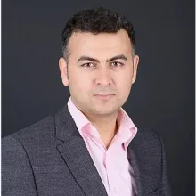 Uzm. Dr. Serhat Kala — Çocuk ve Ergen Psikiyatrisi, Osmaniye. Portre fotoğrafı.