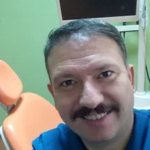 Dt. Cengiz Kartal — Diş Hekimi, Uşak. Portre fotoğrafı.