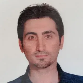 Doç. Dr. Mehmet Gül — Kayseri. Portre fotoğrafı.