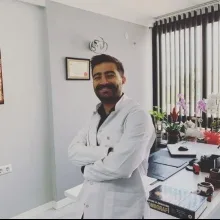 Op. Dr. Faik Uzun — Kadın Hastalıkları Ve Doğum, Mersin. Portre fotoğrafı.