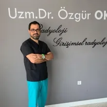 Uzm. Dr. Özgür Oktay — İzmir. Portre fotoğrafı.