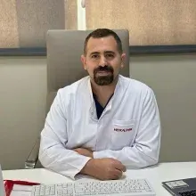 Op. Dr. Cihan Gökler — Genel Cerrahi, Seyhan, Adana. Portre fotoğrafı.