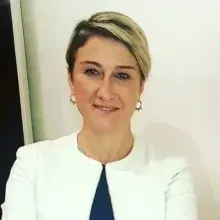 Prof. Dr. Oluş Api — Kadın Hastalıkları Ve Doğum, İstanbul. Portre fotoğrafı.