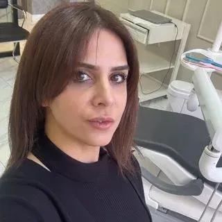 Dt. Esra Kalı Ortakan — Diş Hekimi, Malatya. Portre fotoğrafı.