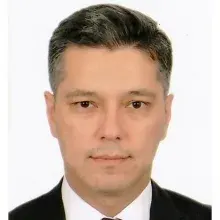 Prof. Dr. Umut Dilek — Kadın Hastalıkları Ve Doğum, İstanbul. Portre fotoğrafı.