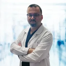 Op. Dr. Berker Kavşı — Kadın Hastalıkları Ve Doğum, Akdeniz, Mersin. Portre fotoğrafı.