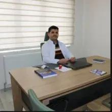 Op. Dr. Turan Arlı — Kulak Burun Boğaz, Erzincan. Portre fotoğrafı.
