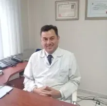 Uzm. Dr. Mehmet Cüneyt Baş — Radyoloji, İstanbul. Portre fotoğrafı.