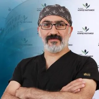Op. Dr. Bakır Tuna — Kulak Burun Boğaz. Portre fotoğrafı.