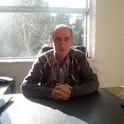 Uzm. Dr. Nihat Beşikçi — Psikiyatri, İstanbul. Portre fotoğrafı.