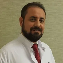Prof. Dr. Cemal Üstün — Bakırköy, İstanbul. Portre fotoğrafı.