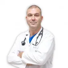 Uzm. Dr. Ömer Erhan Karahasanoğlu — Kardiyoloji, Denizli. Portre fotoğrafı.