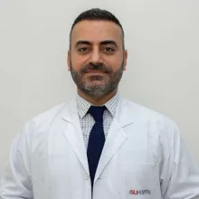 Uzm. Dr. Mehmet Reşit Polat — Göğüs Hastalıkları, İzmir. Portre fotoğrafı.