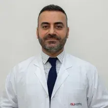 Uzm. Dr. Mehmet Reşit Polat — Göğüs Hastalıkları, İzmir. Portre fotoğrafı.
