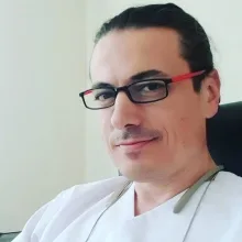 Dr. Coşkun Akay — Ankara. Portre fotoğrafı.