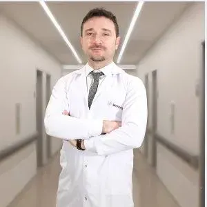 Op. Dr. Mehmet Rauf Koç — Çiğli, İzmir. Portre fotoğrafı.