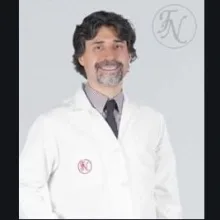 Op. Dr. Aykan Özçelik — Kadın Hastalıkları Ve Doğum, İstanbul. Portre fotoğrafı.