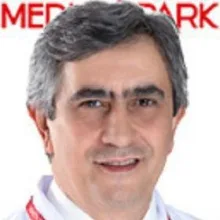 Op. Dr. Ahmet Süha Özer — Kadın Hastalıkları Ve Doğum, Yenimahalle, Ankara. Portre fotoğrafı.