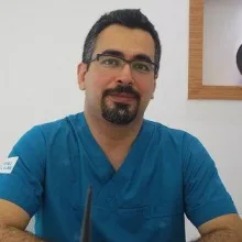 Dr. Dt. Alper Yıldız — Antalya. Portre fotoğrafı.