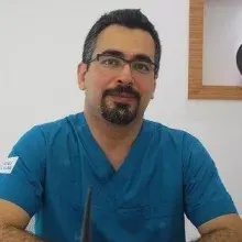 Dr. Dt. Alper Yıldız — Antalya. Portre fotoğrafı.
