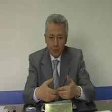 Prof. Dr. İlhami Uslu — Nükleer Tıp, İstanbul. Portre fotoğrafı.
