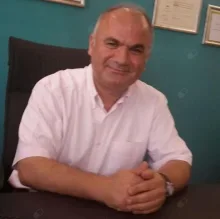 Uzm. Dr. Çetin Özkan — Psikiyatri, Antalya. Portre fotoğrafı.
