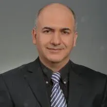 Op. Dr. Enis Fırıncıoğulları — Göz Hastalıkları, Seyhan, Adana. Portre fotoğrafı.