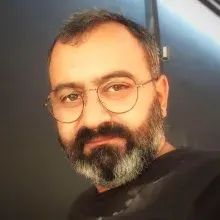 Psk. Dan. Gökhan Tekin — Psikolojik Danışma ve Rehberlik, İzmir. Portre fotoğrafı.