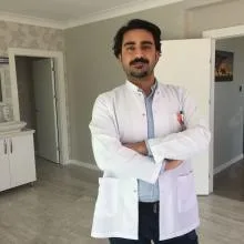 Dt. Hasan Hüseyin Özdemir — Diş Hekimi, Ankara. Portre fotoğrafı.