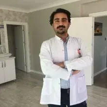 Dt. Hasan Hüseyin Özdemir — Diş Hekimi, Ankara. Portre fotoğrafı.