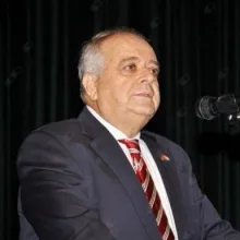 Prof. Dr. Hamdi Rıfat Memişoğlu — Dermatoloji, Adana. Portre fotoğrafı.