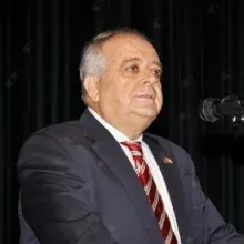 Prof. Dr. Hamdi Rıfat Memişoğlu — Dermatoloji, Adana. Portre fotoğrafı.