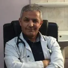 Dr. Mehmet Hilmi Söyler — Akupunktur, İzmir. Portre fotoğrafı.