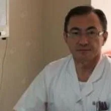 Op. Dr. Saygın Çuhadaroğlu — Genel Cerrahi. Portre fotoğrafı.