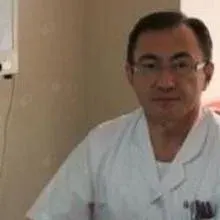 Op. Dr. Saygın Çuhadaroğlu — Genel Cerrahi. Portre fotoğrafı.