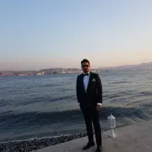 Doç. Dr. Ufuk Atlıhan — Kadın Hastalıkları Ve Doğum, İzmir. Portre fotoğrafı.