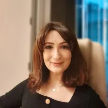 Doç. Dr. İzgi Alnıak — Psikiyatri, İstanbul. Portre fotoğrafı.