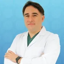Dr. Öğr. Üyesi Uygar Düzci — Genel Cerrahi, Esenler, İstanbul. Portre fotoğrafı.
