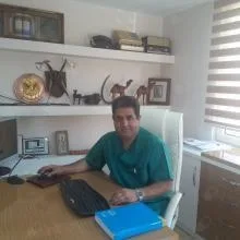 Dt. Hacı Ahmet Aydın — Diş Hekimi, Adana. Portre fotoğrafı.