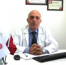 Prof. Dr. Hayrettin Karaeren — Kardiyoloji, Ankara. Portre fotoğrafı.