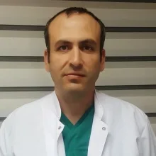 Op. Dr. Ertuğrul Karğı — Genel Cerrahi. Portre fotoğrafı.