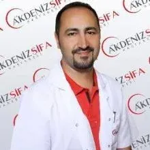 Op. Dr. Aziz Doğru — Kulak Burun Boğaz, Konyaaltı, Antalya. Portre fotoğrafı.