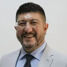 Dr. Melih Nurhan — İzmir. Portre fotoğrafı.