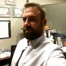 Op. Dr. Yasin Yetişyiğit — Beyin Ve Sinir Cerrahisi, İstanbul. Portre fotoğrafı.