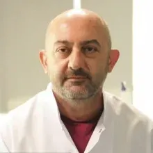 Doç. Dr. Utkan Kamil Akyol — İstanbul. Portre fotoğrafı.