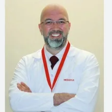Op. Dr. Murat Doruk — Kadın Hastalıkları Ve Doğum, Antalya. Portre fotoğrafı.