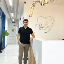 Dt. Emre Temirtaş — Diş Hekimi, Adana. Portre fotoğrafı.