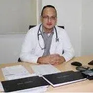Op. Dr. Serdar Memişoğlu — Ortopedi Ve Travmatoloji. Portre fotoğrafı.